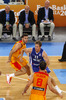 Petteri Koponen (no.11) of Finland attacking while head coach of Finnish team, Henrik Dettmann in background observing the play during FIBA European basketball championships 2013 match of second round between Finland and Spain. Match between Finland and Spain was played on Saturday, 14th of September 2013 in Stozice arena in Ljubljana, Slovenia.
