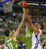 Gerald Lee (no.8) of Finland (R) attacking against Mirza Begic (no.15) of Slovenia (M) and Goran Dragic (no.11) of Slovenia (L) during FIBA European basketball championships 2013 match of second round between Finland and Slovenia. Match between Finland and Slovenia was played on Monday, 16th of September 2013 in Stozice arena in Ljubljana, Slovenia.
