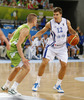 Samuel Haanpaa (no.12) of Finland (R) and Edo Muric (no.8) of Slovenia (L) during FIBA European basketball championships 2013 match of second round between Finland and Slovenia. Match between Finland and Slovenia was played on Monday, 16th of September 2013 in Stozice arena in Ljubljana, Slovenia.
