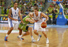 Petteri Koponen (no.11) of Finland (R) attacking while Gerald Lee (no.8) of Finland (L) is trying to block Jaka Blazic (no.9) of Slovenia (M) during FIBA European basketball championships 2013 match of second round between Finland and Slovenia. Match between Finland and Slovenia was played on Monday, 16th of September 2013 in Stozice arena in Ljubljana, Slovenia.
