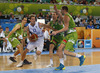 Petteri Koponen (no.11) of Finland (M) attacking between Domen Lorbek (no.13) of Slovenia (L), Jaka Blazic (no.9) of Slovenia and Uros Slokar (no.4) of Slovenia (R) during FIBA European basketball championships 2013 match of second round between Finland and Slovenia. Match between Finland and Slovenia was played on Monday, 16th of September 2013 in Stozice arena in Ljubljana, Slovenia.
