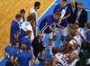 Finnish players gathered around head coach of Finnish team, Henrik Dettmann during one of the timeouts, while injured Hanno Mottola (no.13) of Finland trying to give some instructions during FIBA European basketball championships 2013 match of second round between Finland and Slovenia. Match between Finland and Slovenia was played on Monday, 16th of September 2013 in Stozice arena in Ljubljana, Slovenia.
