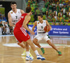 Mantas Kalnietis (no.5) of Lithuania (R) and Bojan Bogdanovic (no.7) of Croatia (L) during FIBA European basketball championships 2013 half final match between Croatia and Lithuania. Half final match of FIBA European basketball championships 2013 between Croatia and Lithuania was played on Friday, 20th of September 2013 in Stozice arena in Ljubljana, Slovenia.

