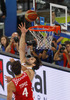 Linas Kleiza (no.11) of Lithuania (R) scoring over Ante Tomic (no.4) of Croatia (L) during FIBA European basketball championships 2013 half final match between Croatia and Lithuania. Half final match of FIBA European basketball championships 2013 between Croatia and Lithuania was played on Friday, 20th of September 2013 in Stozice arena in Ljubljana, Slovenia.
