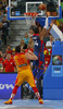 Alexis Ajinca (no.14) of France (R) scoring over Marc Gasol (no.13) of Spain (L) during FIBA European basketball championships 2013 half final match between France and Spain. Half final match of FIBA European basketball championships 2013 between France and Spain was played on Friday, 20th of September 2013 in Stozice arena in Ljubljana, Slovenia.
