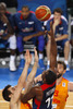 Florent Pietrus (no.11) of France (R) shooting over Victor Claver (no.10) of Spain (L) during FIBA European basketball championships 2013 half final match between France and Spain. Half final match of FIBA European basketball championships 2013 between France and Spain was played on Friday, 20th of September 2013 in Stozice arena in Ljubljana, Slovenia.
