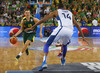 Renaldas Seibutis (no.10) of Lithuania (L) and Alexis Ajinca (no.14) of France (R) during FIBA European basketball championships 2013 final match between France and Lithuania. Final match of FIBA European basketball championships 2013 between France and Lithuania was played on Sunday, 22nd of September 2013 in Stozice arena in Ljubljana, Slovenia.
