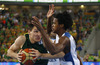Mindaugas Kuzminskas (no.6) of Lithuania (L) and Mickael Gelabale (no.15) of France (R) during FIBA European basketball championships 2013 final match between France and Lithuania. Final match of FIBA European basketball championships 2013 between France and Lithuania was played on Sunday, 22nd of September 2013 in Stozice arena in Ljubljana, Slovenia.
