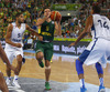 Mantas Kalnietis (no.5) of Lithuania (M) between Nicolas Batum (no.5) of France (L) and Alexis Ajinca (no.14) of France (R) during FIBA European basketball championships 2013 final match between France and Lithuania. Final match of FIBA European basketball championships 2013 between France and Lithuania was played on Sunday, 22nd of September 2013 in Stozice arena in Ljubljana, Slovenia.
