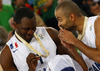 Florent Pietrus (no.11) of France (L) and Tony Parker (no.9) of France (R) celebrate their victory and European champions title after end of the FIBA European basketball championships 2013 final match between France and Lithuania. Final match of FIBA European basketball championships 2013 between France and Lithuania was played on Sunday, 22nd of September 2013 in Stozice arena in Ljubljana, Slovenia.
