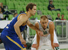 Petteri Koponen (no.8) of Khimki Moscow (L) and Sasu Salin (no.10) of Union Olimpija (R) during match of FIBA basketball Euro Cup match between KK Union Olimpija, Ljubljana, Slovenia, and Khimki Moscow, Russia. Match between Union Olimpija and Khimki Moscow was closed for public as result of incident last season, and was played in Stozice Arena in Ljubljana, Slovenia, on Wednesday, 22nd of October 2014.
