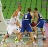 Petteri Koponen (no.8) of Khimki Moscow (R) and Sasu Salin (no.10) of Union Olimpija (L) during match of FIBA basketball Euro Cup match between KK Union Olimpija, Ljubljana, Slovenia, and Khimki Moscow, Russia. Match between Union Olimpija and Khimki Moscow was closed for public as result of incident last season, and was played in Stozice Arena in Ljubljana, Slovenia, on Wednesday, 22nd of October 2014.
