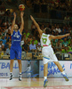Ville Kaunisto (no.21) of Finland shooting over Sasa Zagorac (no.17) of Slovenia during basketball match of Adecco cup between Finland and Slovenia. Basketball match of Adecco cup between Finland and Slovenia was played in Bonifika arena in Koper, Slovenia, on Saturday, 22nd of August 2015.
