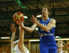 Petteri Koponen (no.11) of Finland (R) shooting over Miha Zupan (no.13) of Slovenia (L) during basketball match of Adecco cup between Finland and Slovenia. Basketball match of Adecco cup between Finland and Slovenia was played in Bonifika arena in Koper, Slovenia, on Saturday, 22nd of August 2015.
