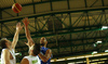 Gerald Lee (no.8) of Finland shooting over Mitja Nikolic (no.10) of Slovenia (M) and Uros Slokar (no.55) of Slovenia (L) during basketball match of Adecco cup between Finland and Slovenia. Basketball match of Adecco cup between Finland and Slovenia was played in Bonifika arena in Koper, Slovenia, on Saturday, 22nd of August 2015.
