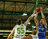 Tuukka Kotti (no.10) of Finland (R) shooting over Nebojsa Joksimovic (no.1) of Slovenia (M) and Uros Slokar (no.55) of Slovenia (L) during basketball match of Adecco cup between Finland and Slovenia. Basketball match of Adecco cup between Finland and Slovenia was played in Bonifika arena in Koper, Slovenia, on Saturday, 22nd of August 2015.
