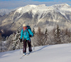 Ski tourer during ski tour in Velika Planina above Kamnik, Slovenia on sunny Saturday, 20th of February 2016.
