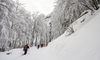 Ski touring in mountains around Vrsic pass above Kranjska Gora, Slovenia.