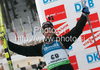 Second placed Simon Fourcade of France celebrating his medal won in men 20km individual race of e.on Ruhrgas IBU Biathlon World Cup 2009-10. Men individual race of e.on Ruhrgas IBU Biathlon World Cup was held in Pokljuka, Slovenia, on 17th of December 2009.
