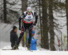 Olli Hiidensalo of Finland competes during men IBU E.on Biathlon World cup sprint race in Pokljuka, Slovenia. Men sprint race of IBU E.on Biathlon World cup was held on Thursday, 6th of March 2014 in Pokljuka, Slovenia.
