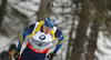 Winner Bjoern Ferry of Sweden competes during men IBU E.on Biathlon World cup sprint race in Pokljuka, Slovenia. Men sprint race of IBU E.on Biathlon World cup was held on Thursday, 6th of March 2014 in Pokljuka, Slovenia.
