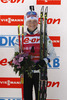 Winner Kaisa Makarainen of Finland at the flower ceremony of the women IBU E.on Biathlon World cup pursuit race in Pokljuka, Slovenia. Women pursuit race of IBU E.on Biathlon World cup was held on Saturday, 8th of March 2014 in Pokljuka, Slovenia.
