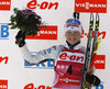 Winner Kaisa Makarainen of Finland at the flower ceremony of the women IBU E.on Biathlon World cup pursuit race in Pokljuka, Slovenia. Women pursuit race of IBU E.on Biathlon World cup was held on Saturday, 8th of March 2014 in Pokljuka, Slovenia.
