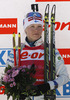Winner Kaisa Makarainen of Finland at the flower ceremony of the women IBU E.on Biathlon World cup pursuit race in Pokljuka, Slovenia. Women pursuit race of IBU E.on Biathlon World cup was held on Saturday, 8th of March 2014 in Pokljuka, Slovenia.
