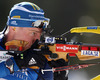Winner Bjoern Ferry of Sweden shooting during men IBU E.on Biathlon World cup mass start race in Pokljuka, Slovenia. 15km long men mass start race of IBU E.on Biathlon World cup was held on Sunday, 9th of March 2014 in Pokljuka, Slovenia.
