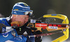 Winner Bjoern Ferry of Sweden shooting during men IBU E.on Biathlon World cup mass start race in Pokljuka, Slovenia. 15km long men mass start race of IBU E.on Biathlon World cup was held on Sunday, 9th of March 2014 in Pokljuka, Slovenia.
