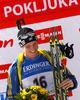 Winner Bjoern Ferry of Sweden celebrates his medal won in men IBU E.on Biathlon World cup mass start race in Pokljuka, Slovenia. 15km long men mass start race of IBU E.on Biathlon World cup was held on Sunday, 9th of March 2014 in Pokljuka, Slovenia.
