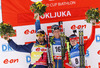 Winner Bjoern Ferry of Sweden (M), second placed Martin Fourcade of France (L) and third placed Evgeny Ustyugov of Russia (R) celebrate their medals won in men IBU E.on Biathlon World cup mass start race in Pokljuka, Slovenia. 15km long men mass start race of IBU E.on Biathlon World cup was held on Sunday, 9th of March 2014 in Pokljuka, Slovenia.
