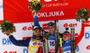Winner Bjoern Ferry of Sweden (M), second placed Martin Fourcade of France (L) and third placed Evgeny Ustyugov of Russia (R) celebrate their medals won in men IBU E.on Biathlon World cup mass start race in Pokljuka, Slovenia. 15km long men mass start race of IBU E.on Biathlon World cup was held on Sunday, 9th of March 2014 in Pokljuka, Slovenia.
