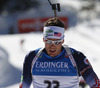 Tim Burke of USA competes during men IBU E.on Biathlon World cup mass start race in Pokljuka, Slovenia. 15km long men mass start race of IBU E.on Biathlon World cup was held on Sunday, 9th of March 2014 in Pokljuka, Slovenia.
