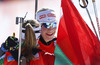 Winner Darya Domracheva of Belarus (L) accepts congratulations from second placed Kaisa Makarainen of Finland (R) after end of women IBU E.on Biathlon World cup mass start race in Pokljuka, Slovenia. 12.5km long women mass start race of IBU E.on Biathlon World cup was held on Sunday, 9th of March 2014 in Pokljuka, Slovenia.
