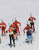 Athletes heading to course after start of the women IBU E.on Biathlon World cup mass start race in Pokljuka, Slovenia. 12.5km long women mass start race of IBU E.on Biathlon World cup was held on Sunday, 9th of March 2014 in Pokljuka, Slovenia.
