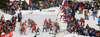 Athletes heading to course after start of the women IBU E.on Biathlon World cup mass start race in Pokljuka, Slovenia. 12.5km long women mass start race of IBU E.on Biathlon World cup was held on Sunday, 9th of March 2014 in Pokljuka, Slovenia.
