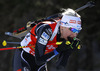 Kaisa Makarainen of Finland competes during women IBU E.on Biathlon World cup mass start race in Pokljuka, Slovenia. 12.5km long women mass start race of IBU E.on Biathlon World cup was held on Sunday, 9th of March 2014 in Pokljuka, Slovenia.
