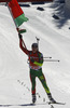 Winner Darya Domracheva of Belarus celebrates her victory crossing finish line during women IBU E.on Biathlon World cup mass start race in Pokljuka, Slovenia. 12.5km long women mass start race of IBU E.on Biathlon World cup was held on Sunday, 9th of March 2014 in Pokljuka, Slovenia.
