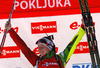Winner Darya Domracheva of Belarus celebrates her medal won in women IBU E.on Biathlon World cup mass start race in Pokljuka, Slovenia. 12.5km long women mass start race of IBU E.on Biathlon World cup was held on Sunday, 9th of March 2014 in Pokljuka, Slovenia.

