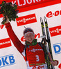 Winner Darya Domracheva of Belarus celebrates her medal won in women IBU E.on Biathlon World cup mass start race in Pokljuka, Slovenia. 12.5km long women mass start race of IBU E.on Biathlon World cup was held on Sunday, 9th of March 2014 in Pokljuka, Slovenia.
