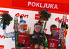 Winner Darya Domracheva of Belarus (M), second placed Kaisa Makarainen of Finland (L) and theird placed Olga Zaitseva of Russia (R) celebrate their medals won in women IBU E.on Biathlon World cup mass start race in Pokljuka, Slovenia. 12.5km long women mass start race of IBU E.on Biathlon World cup was held on Sunday, 9th of March 2014 in Pokljuka, Slovenia.
