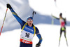 Winner Bjoern Ferry of Sweden celebrates his victory crossing finish line during men IBU E.on Biathlon World cup mass start race in Pokljuka, Slovenia. 15km long men mass start race of IBU E.on Biathlon World cup was held on Sunday, 9th of March 2014 in Pokljuka, Slovenia.
