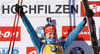 Winner Kaisa Makarainen of Finland celebrates her medal won in Women sprint race of IBU Biathlon World Cup in Hochfilzen, Austria. Women sprint race of IBU Biathlon World cup was held on Friday, 12th of December 2014 in Hochfilzen, Austria.
