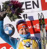 Winner Kaisa Makarainen of Finland celebrates her medal won in Women sprint race of IBU Biathlon World Cup in Hochfilzen, Austria. Women sprint race of IBU Biathlon World cup was held on Friday, 12th of December 2014 in Hochfilzen, Austria.
