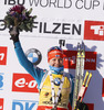 Winner Kaisa Makarainen of Finland celebrates her medal won in Women sprint race of IBU Biathlon World Cup in Hochfilzen, Austria. Women sprint race of IBU Biathlon World cup was held on Friday, 12th of December 2014 in Hochfilzen, Austria.
