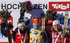 Winner Kaisa Makarainen of Finland (M), second placed Karin Oberhofer of Italy (L) and third placed Tiril Eckhoff of Norway (R) celebrate their medals won in Women sprint race of IBU Biathlon World Cup in Hochfilzen, Austria. Women sprint race of IBU Biathlon World cup was held on Friday, 12th of December 2014 in Hochfilzen, Austria.
