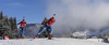 Yana Romanova of Russia (front) and Ekaterina Glazyrina of Russia (back) during Women sprint race of IBU Biathlon World Cup in Hochfilzen, Austria. Women sprint race of IBU Biathlon World cup was held on Friday, 12th of December 2014 in Hochfilzen, Austria.
