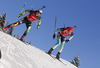 Nastassia Dubarezava of Belarus (L) and Olga Abramova of Ukraine (R) during Women sprint race of IBU Biathlon World Cup in Hochfilzen, Austria. Women sprint race of IBU Biathlon World cup was held on Friday, 12th of December 2014 in Hochfilzen, Austria.
