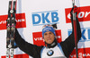 Second placed Simon Schempp of Germany celebrates his medal won in Men sprint race of IBU Biathlon World Cup in Hochfilzen, Austria. Men sprint race of IBU Biathlon World cup was held on Friday, 12th of December 2014 in Hochfilzen, Austria.
